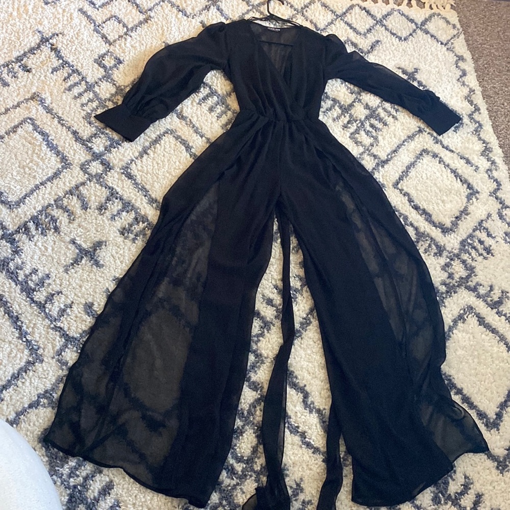 Fashion nova black jumpsuit, split legs. Short lining underneath